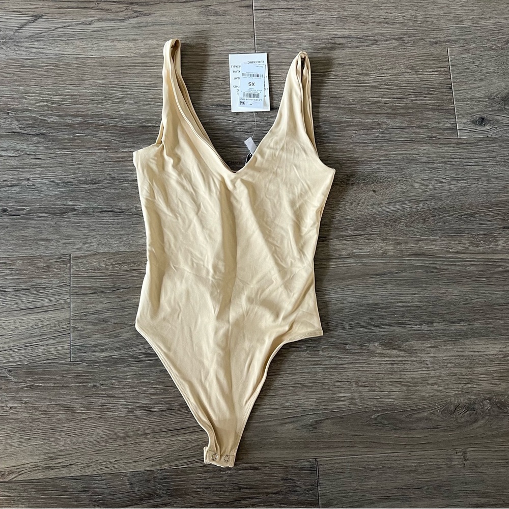NWT v-neck bodysuit